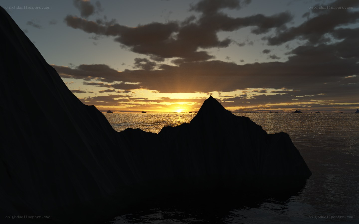 Sunset over rocky coastline