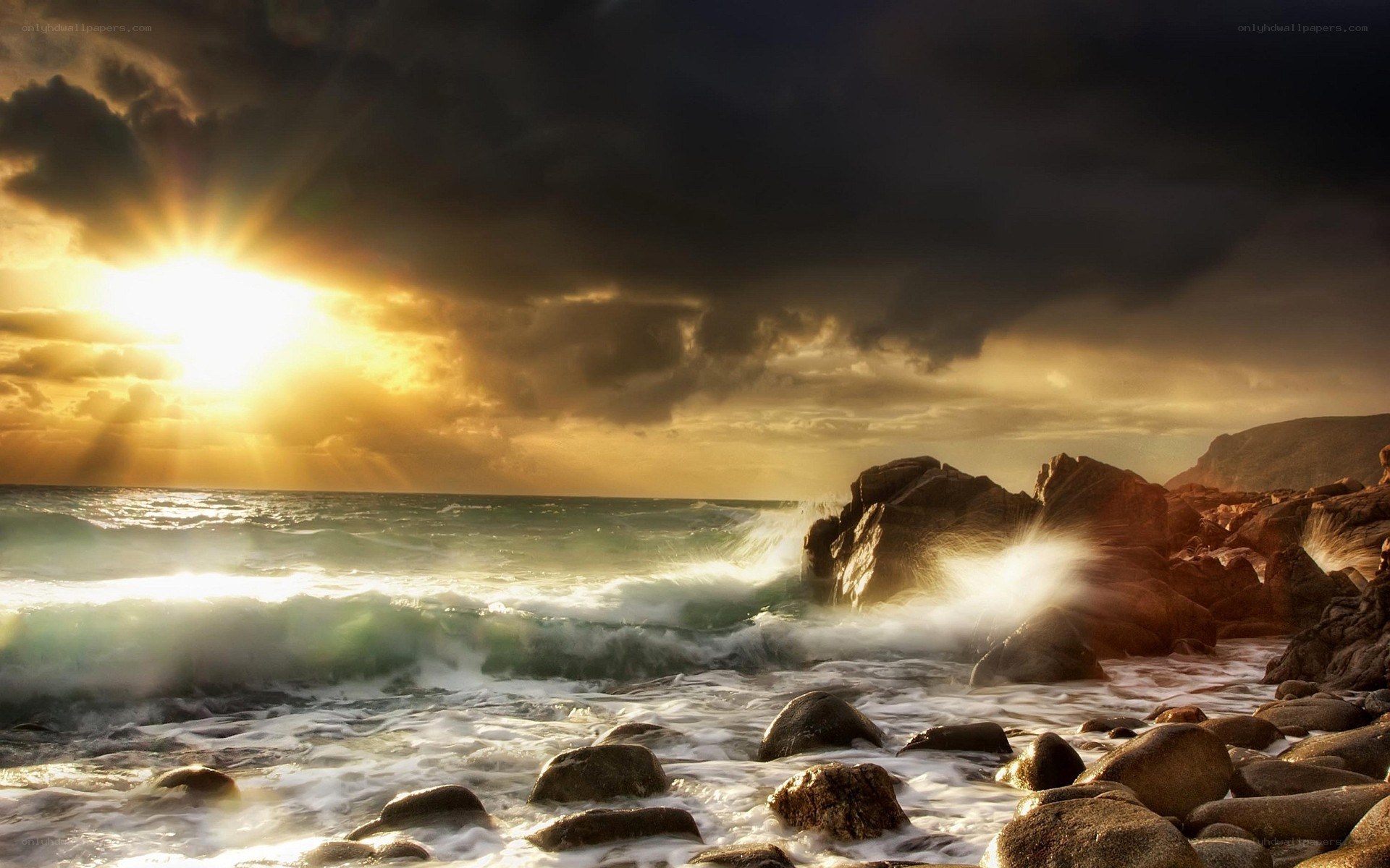 Sunset over rocky coastline