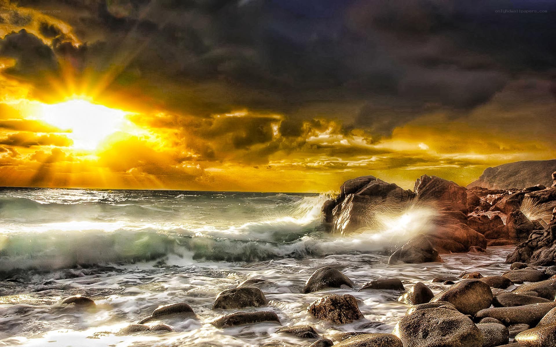 Sunset over rocky coastline