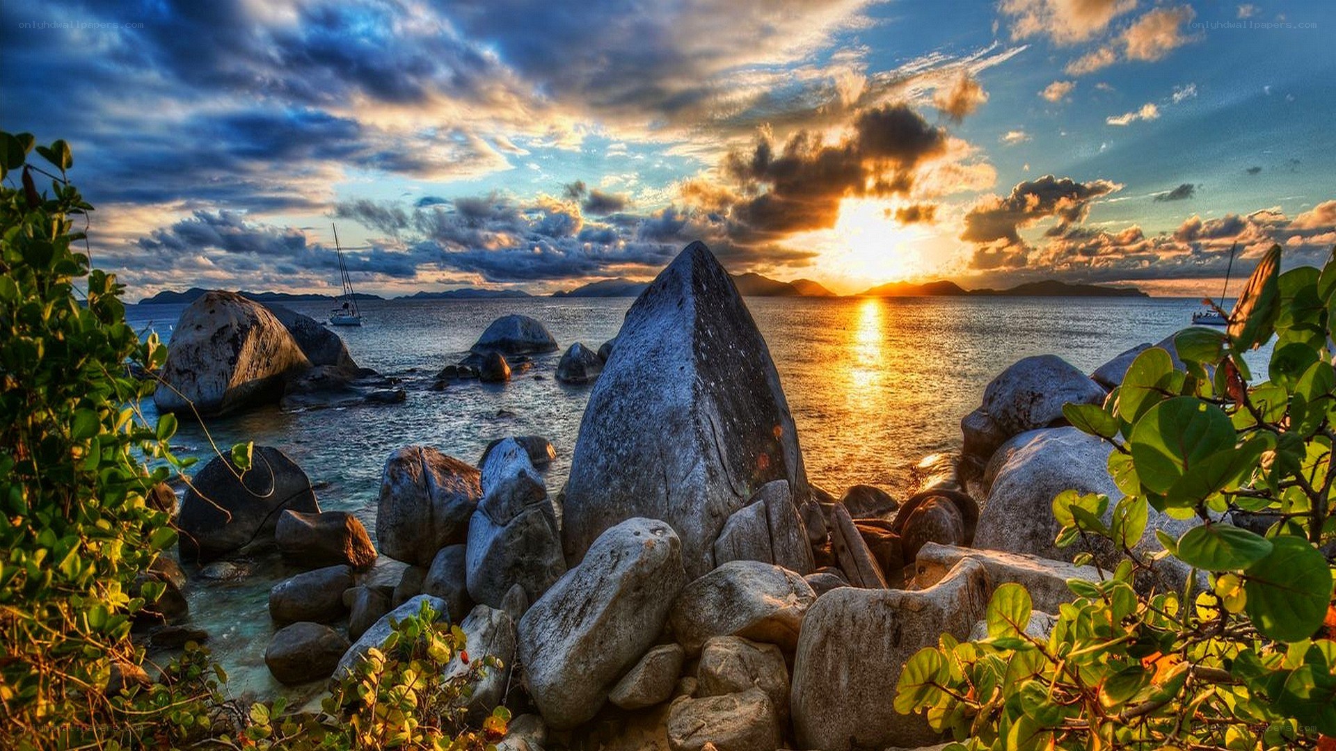 Sunset over rocky coastline