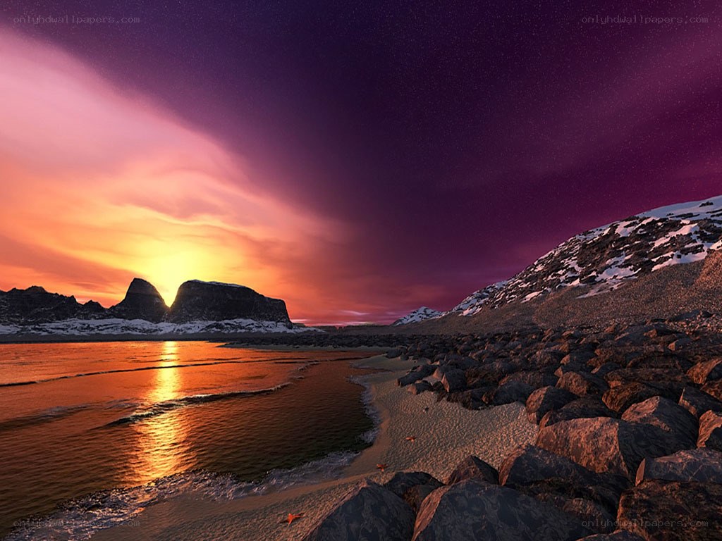 Sunset over rocky coastline