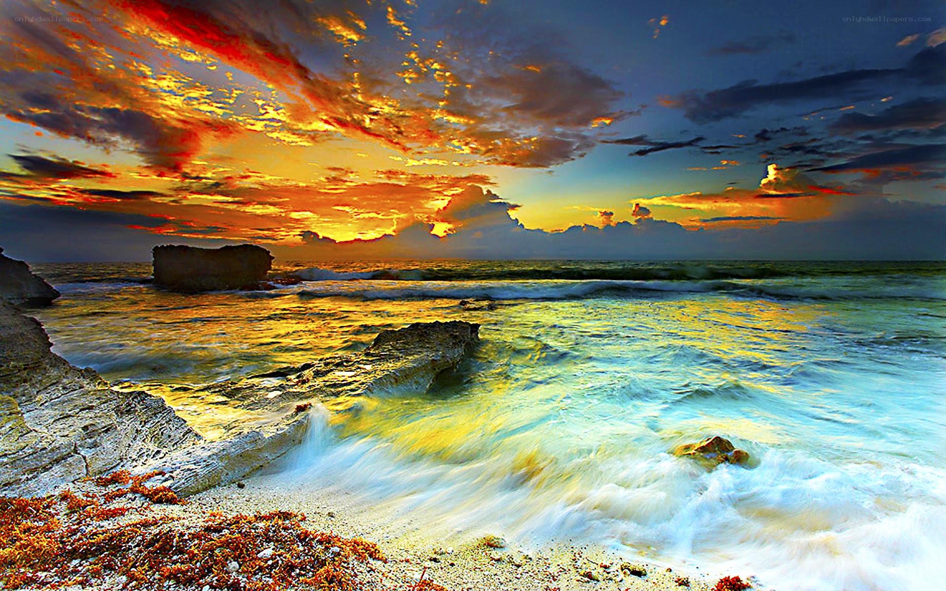 Sunset over rocky coastline