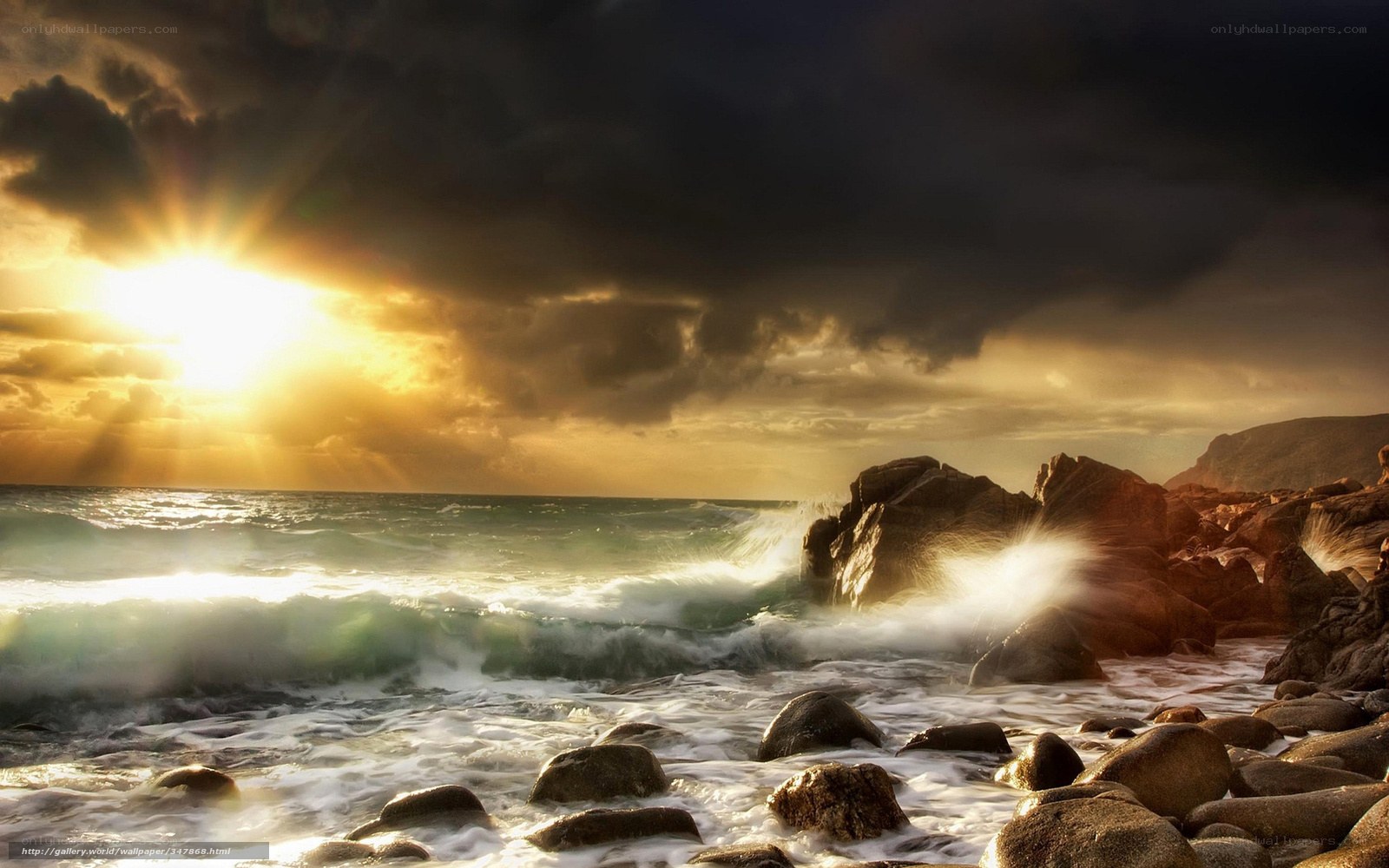 Sunset over rocky coastline