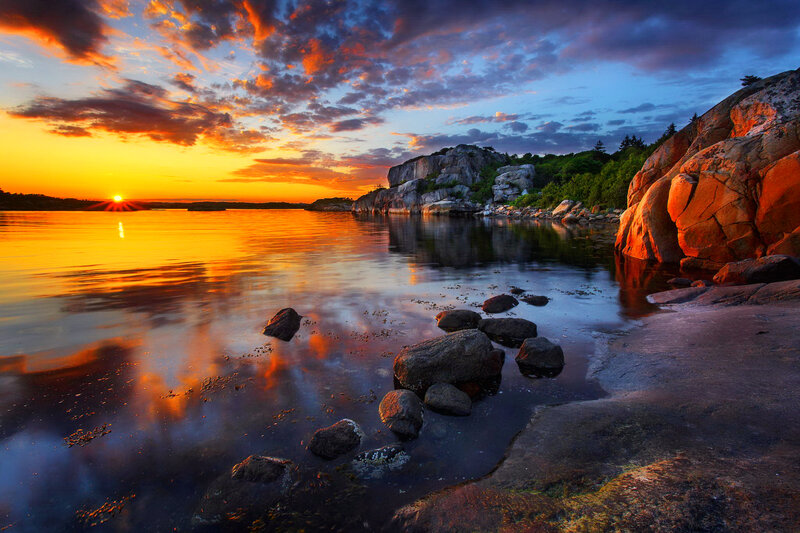 Sunset over Rocky Coastline — Orange, Dramatic, Photograph, Sun
