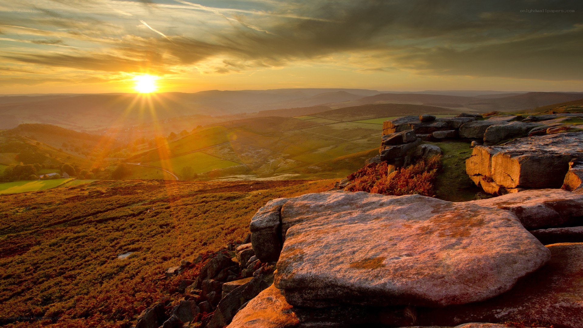 Sunset over rocky hills