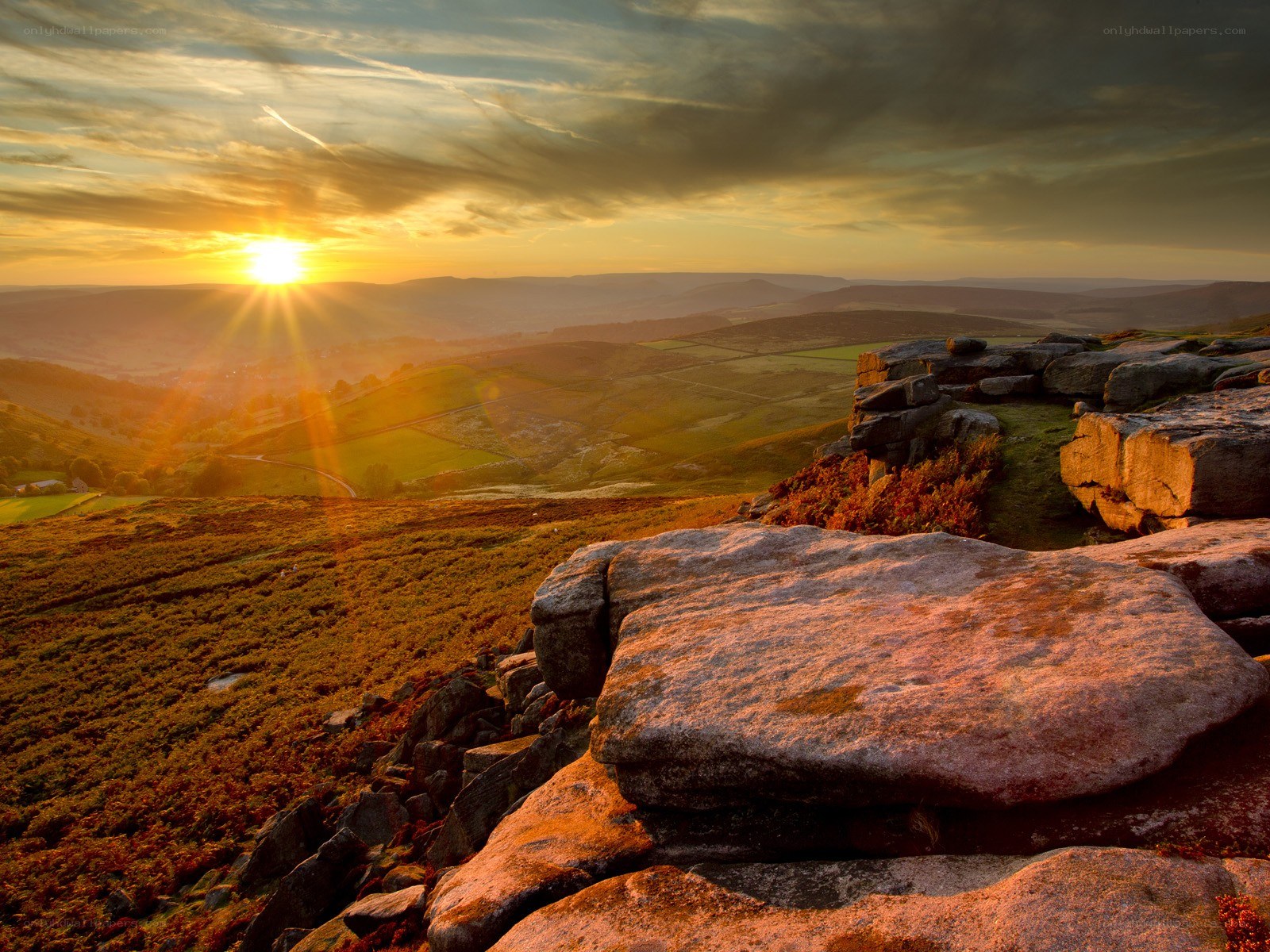 Sunset over rocky hills