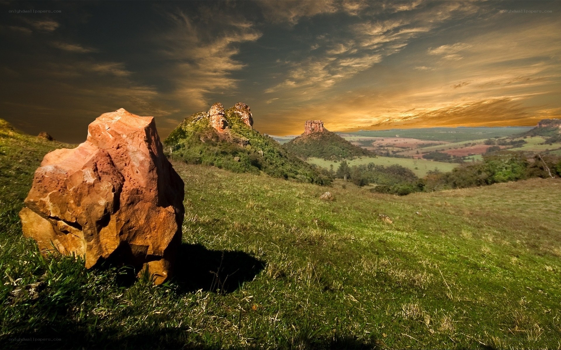 Sunset over rocky hills