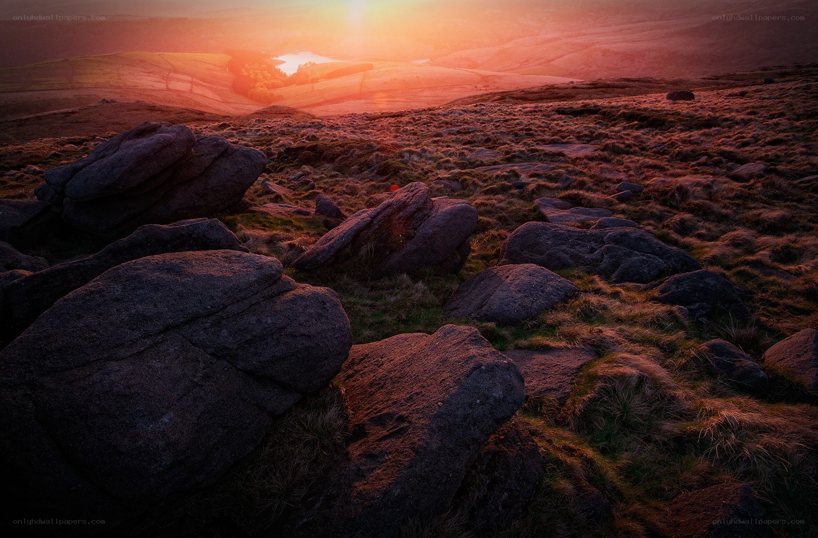 Sunset over rocky hills