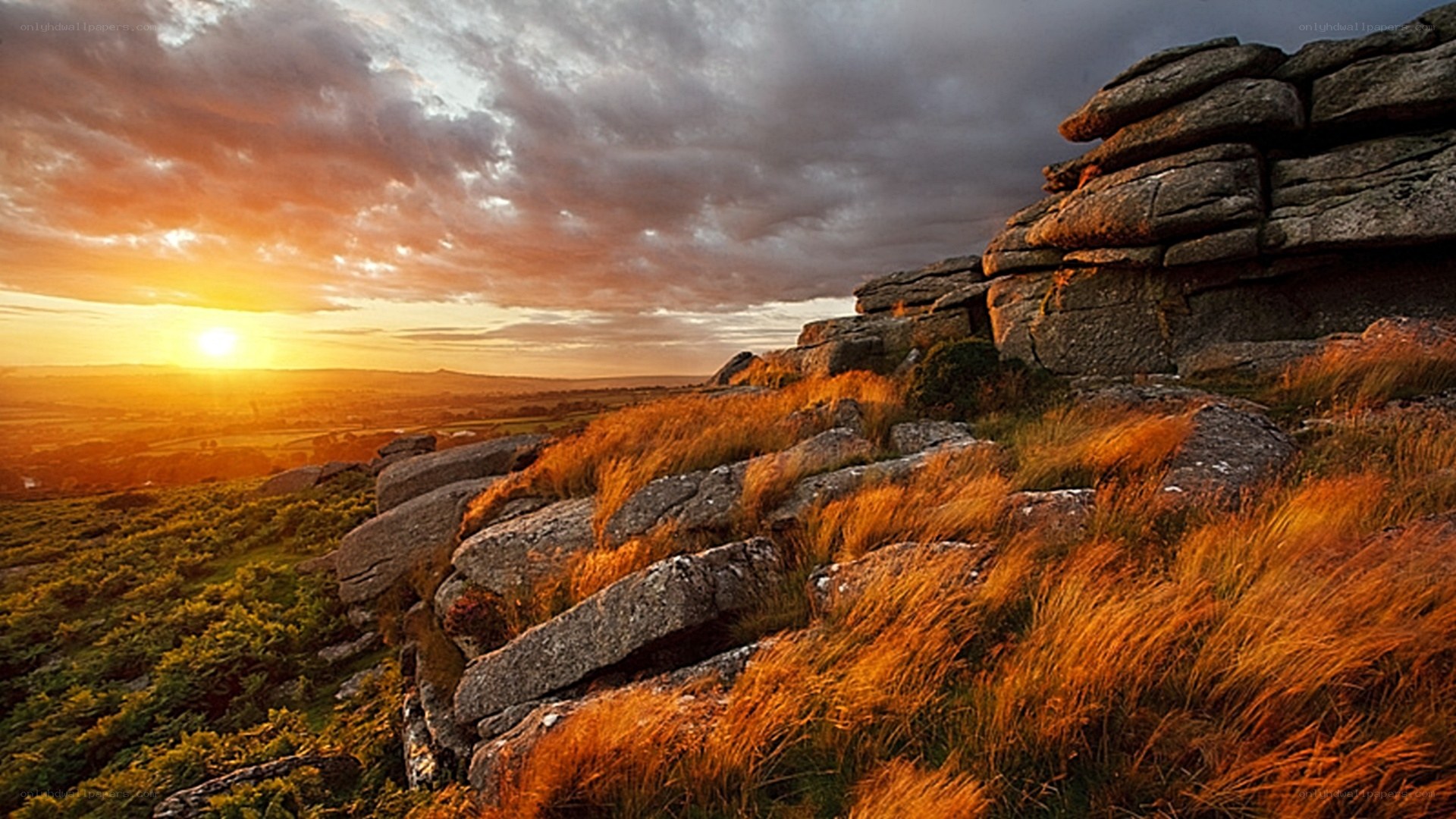 Sunset over rocky hills