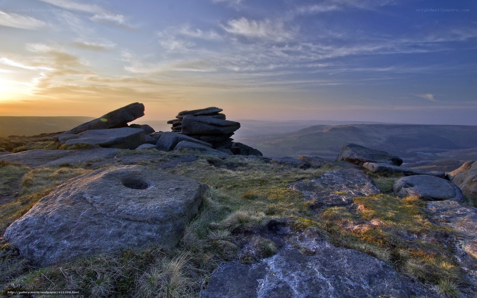 Sunset over rocky hills