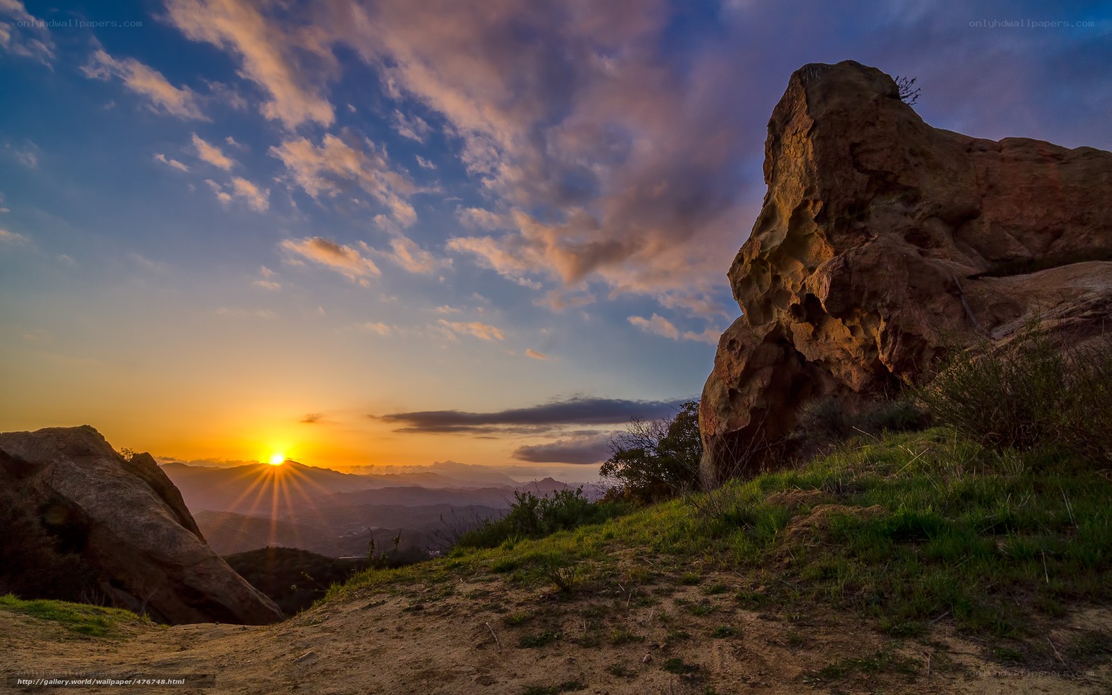 Sunset over rocky hills