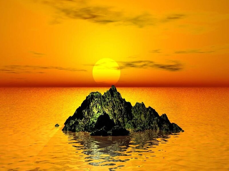 Sunset over rocky island