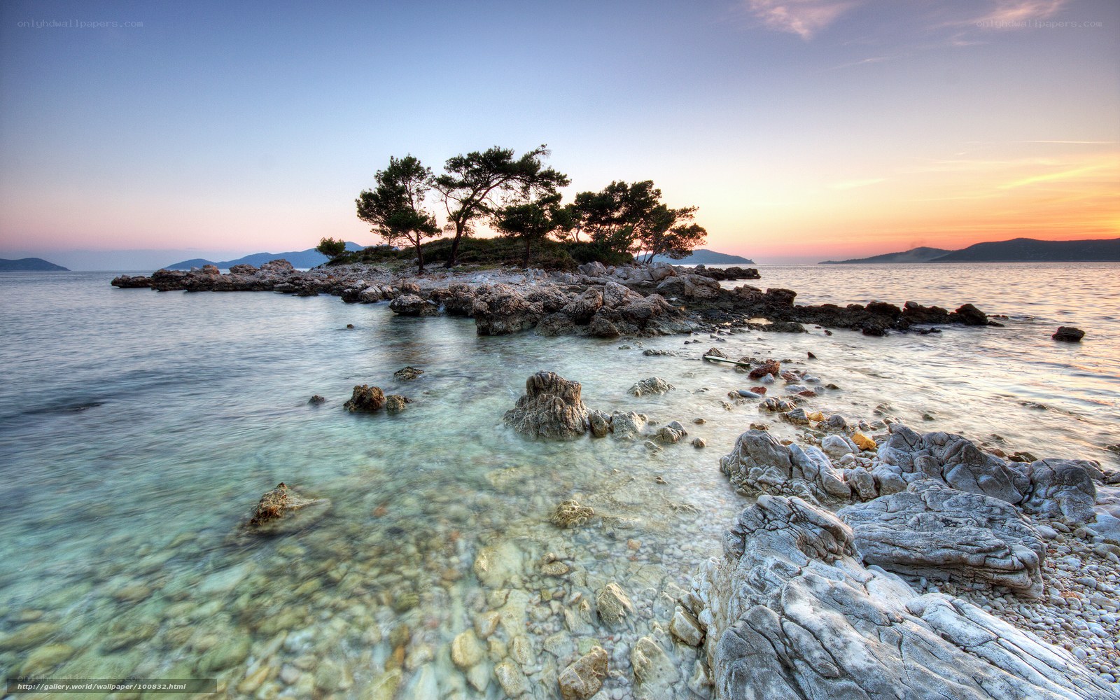 Sunset over rocky island