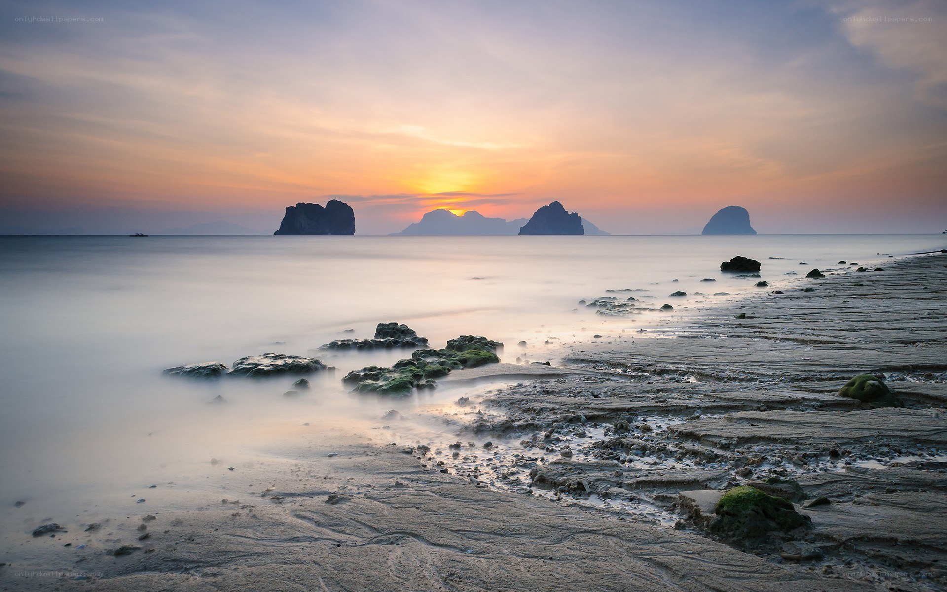 Sunset over rocky islands
