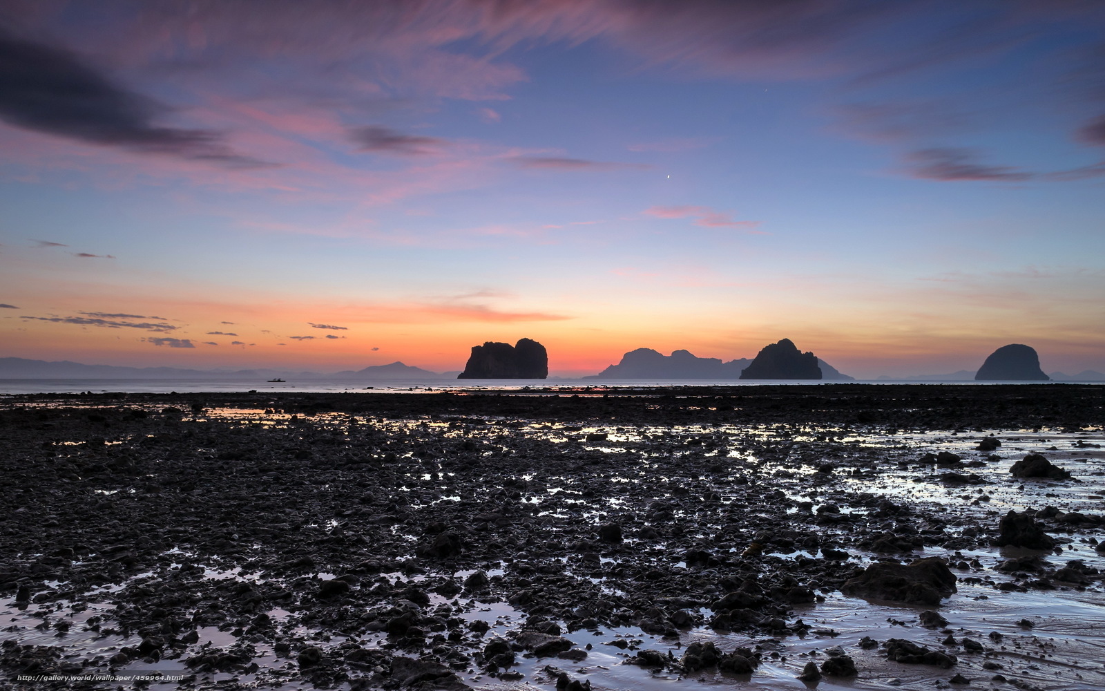 Sunset over rocky islands