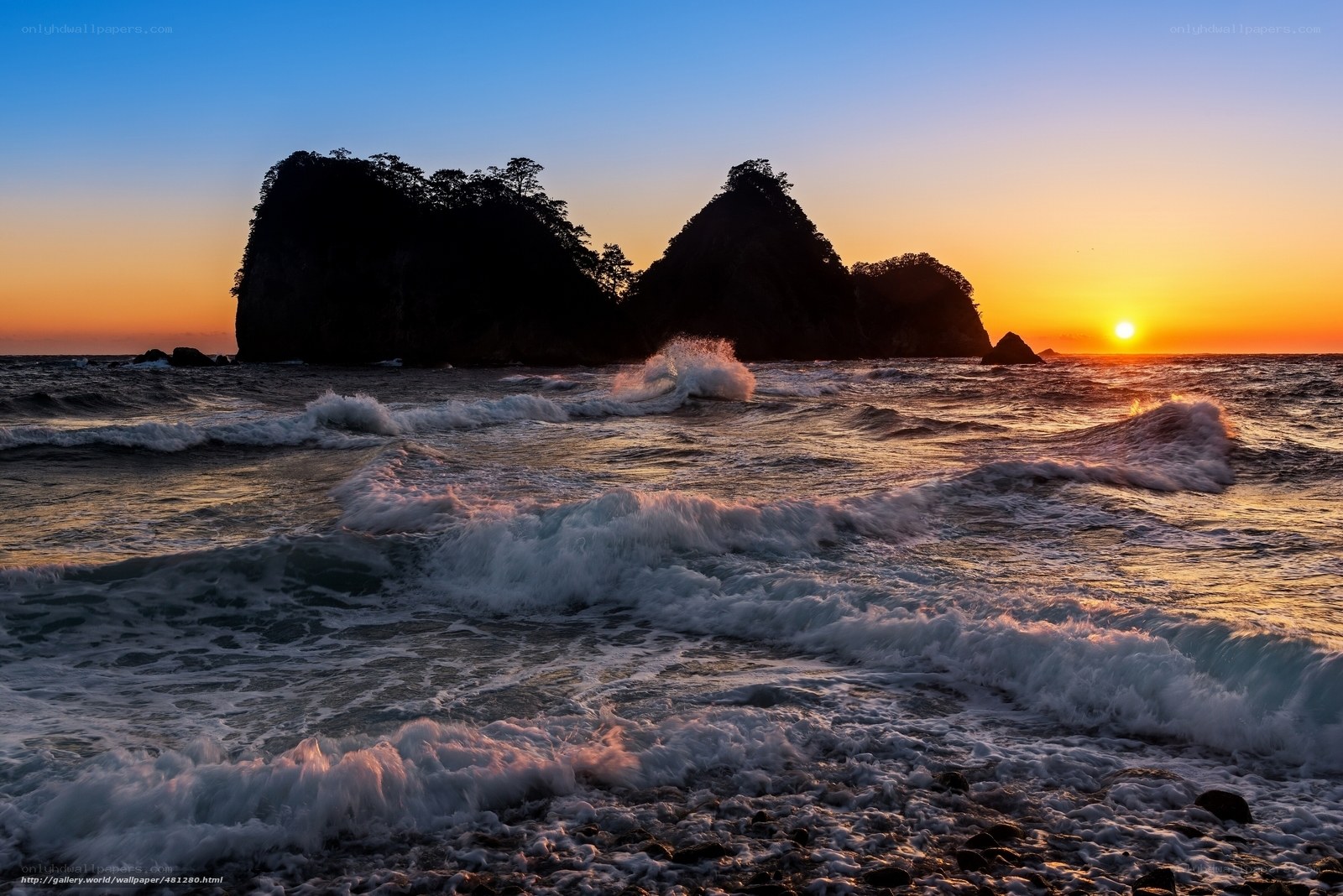 Sunset over rocky islands