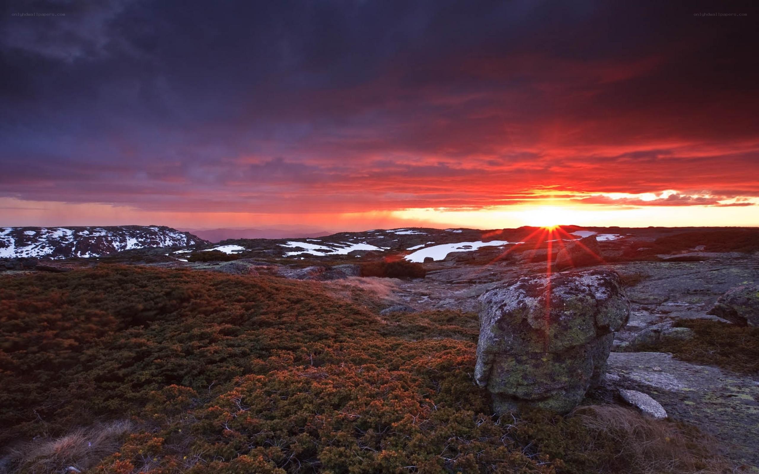 Sunset over rocky landscape