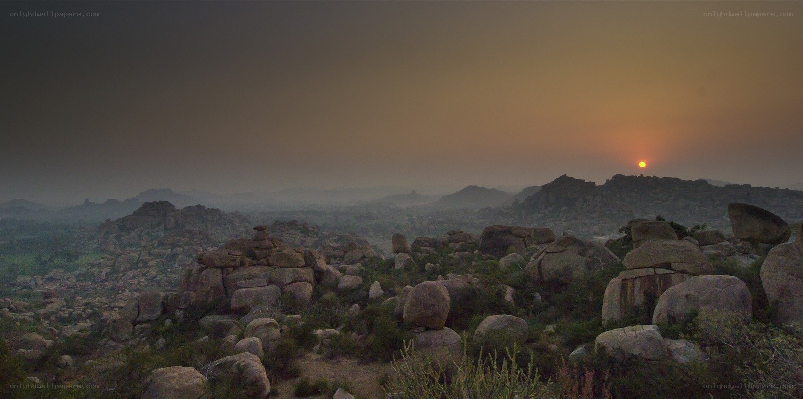 Sunset over rocky landscape