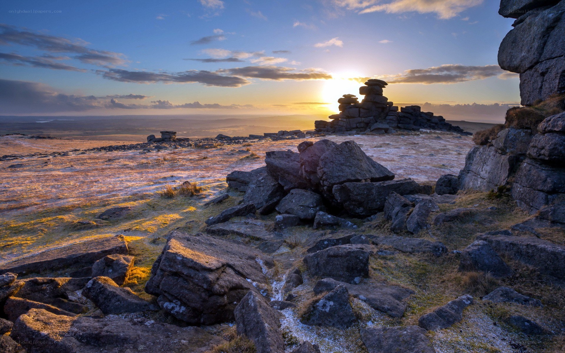 Sunset over rocky moorland