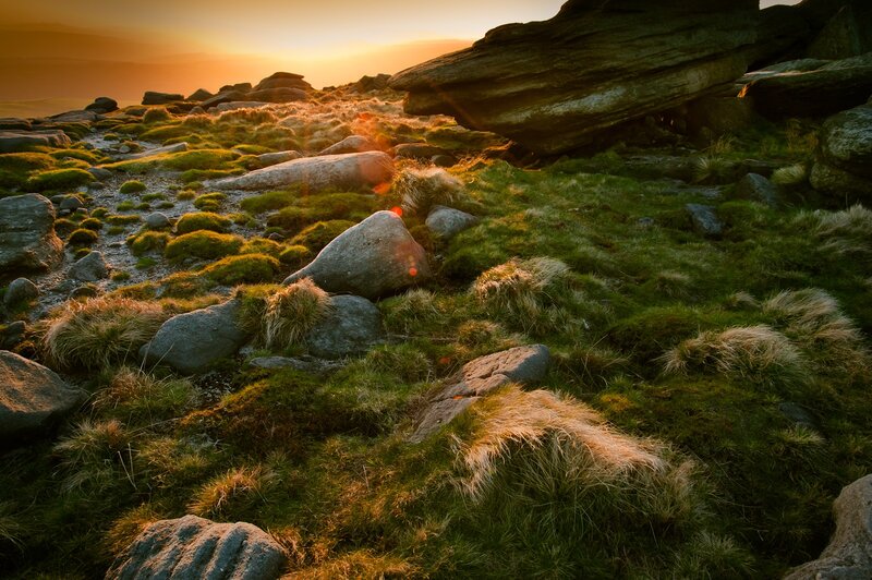 Sunset over rocky moorland