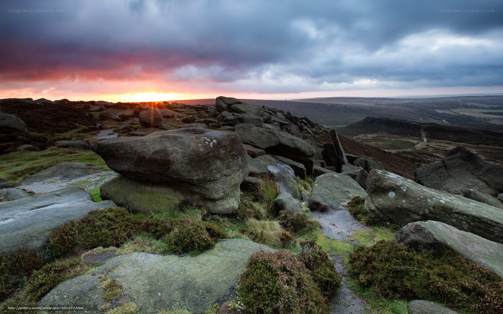Sunset over rocky moorland