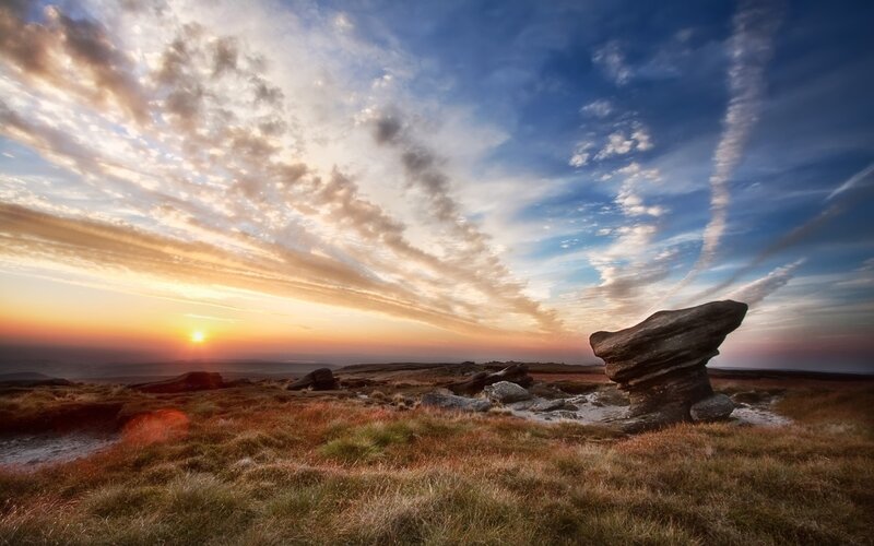Sunset over rocky moorland