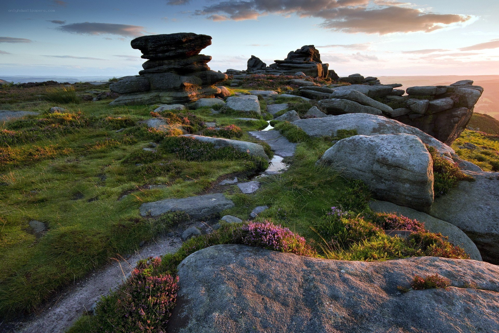 Sunset over rocky moorland