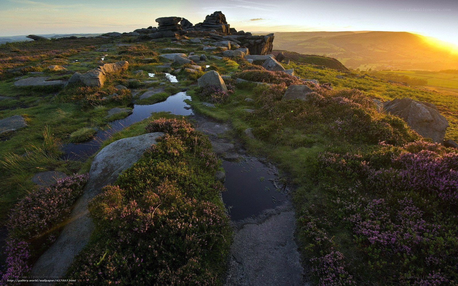 Sunset over rocky moorland