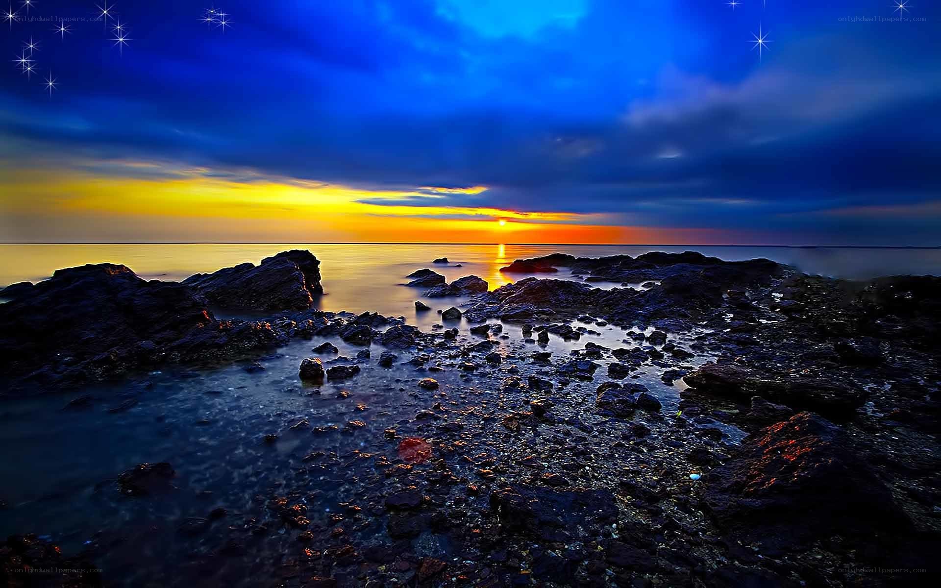Sunset over rocky shore