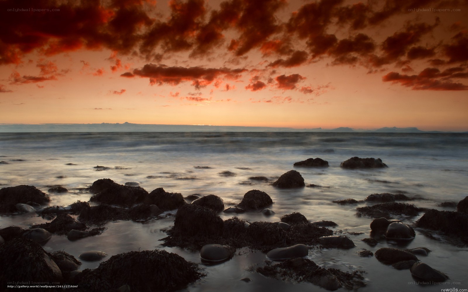 Sunset over rocky shore