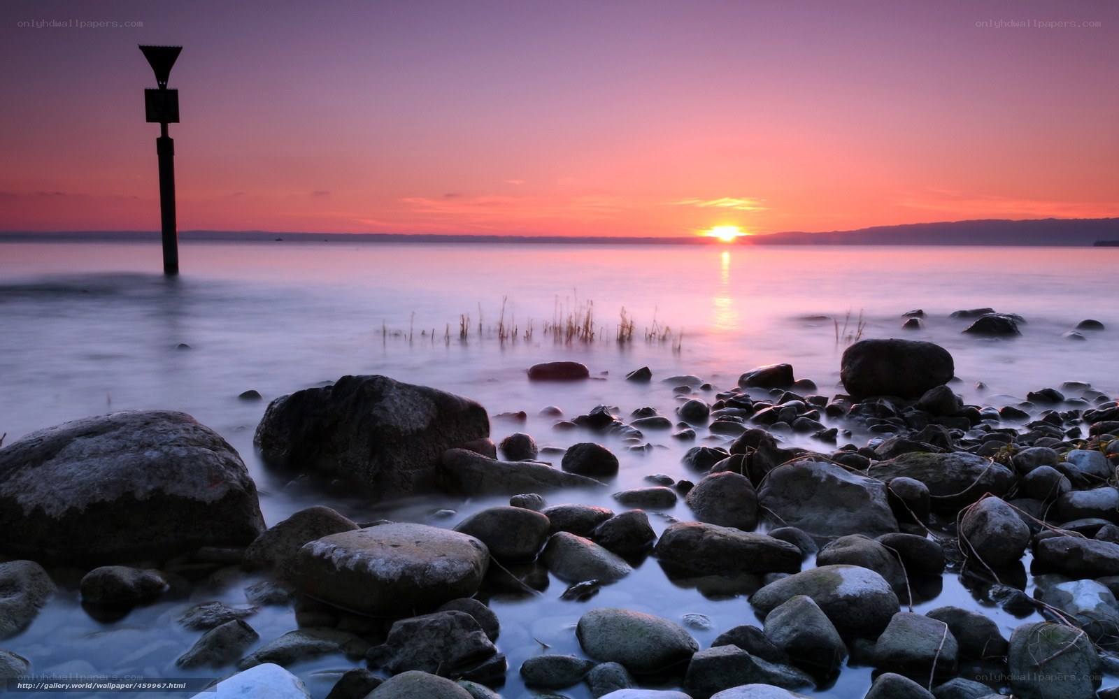 Sunset over rocky shore