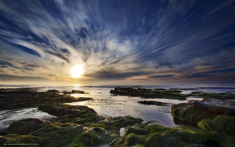 Sunset over rocky shore