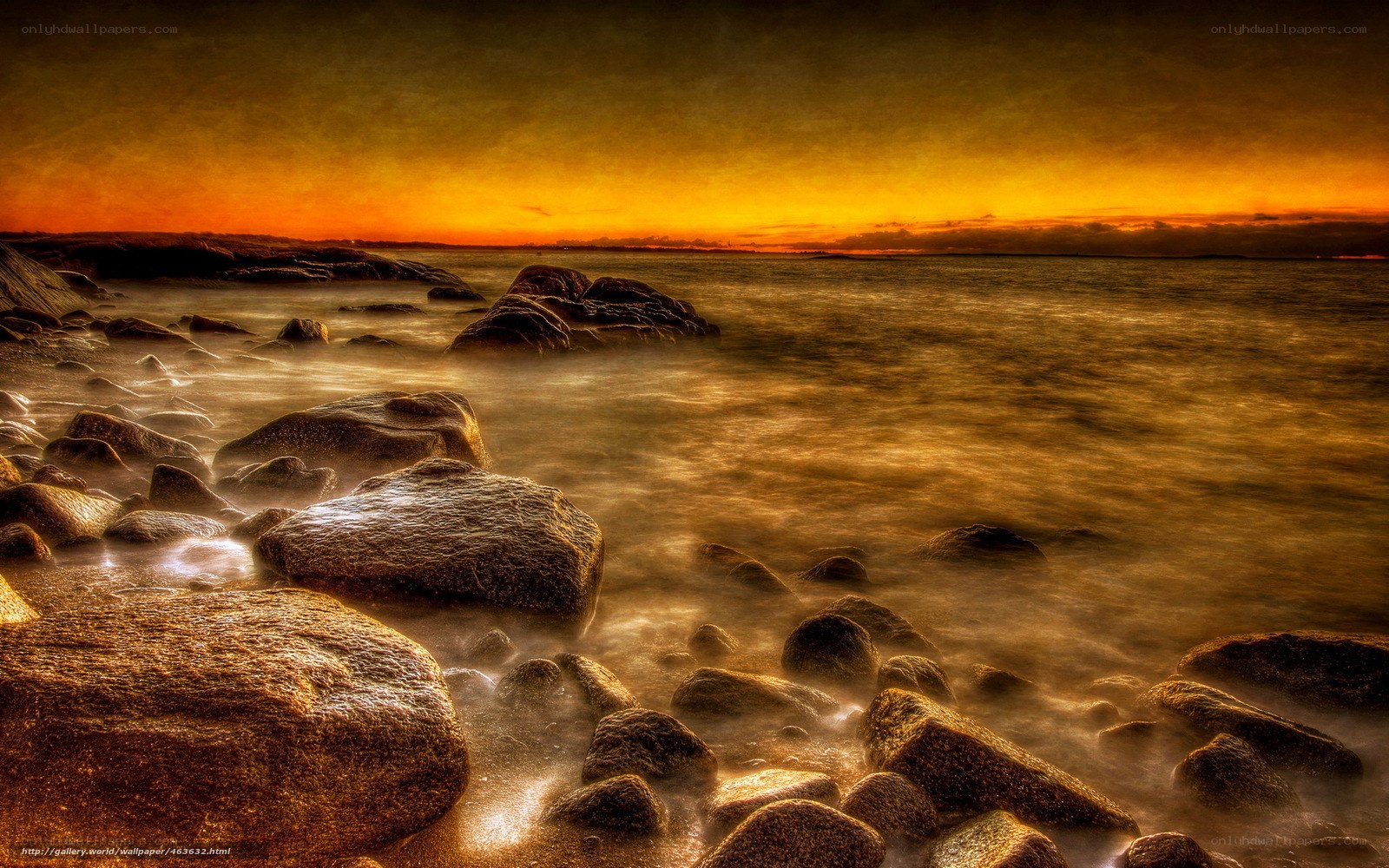 Sunset over rocky shore