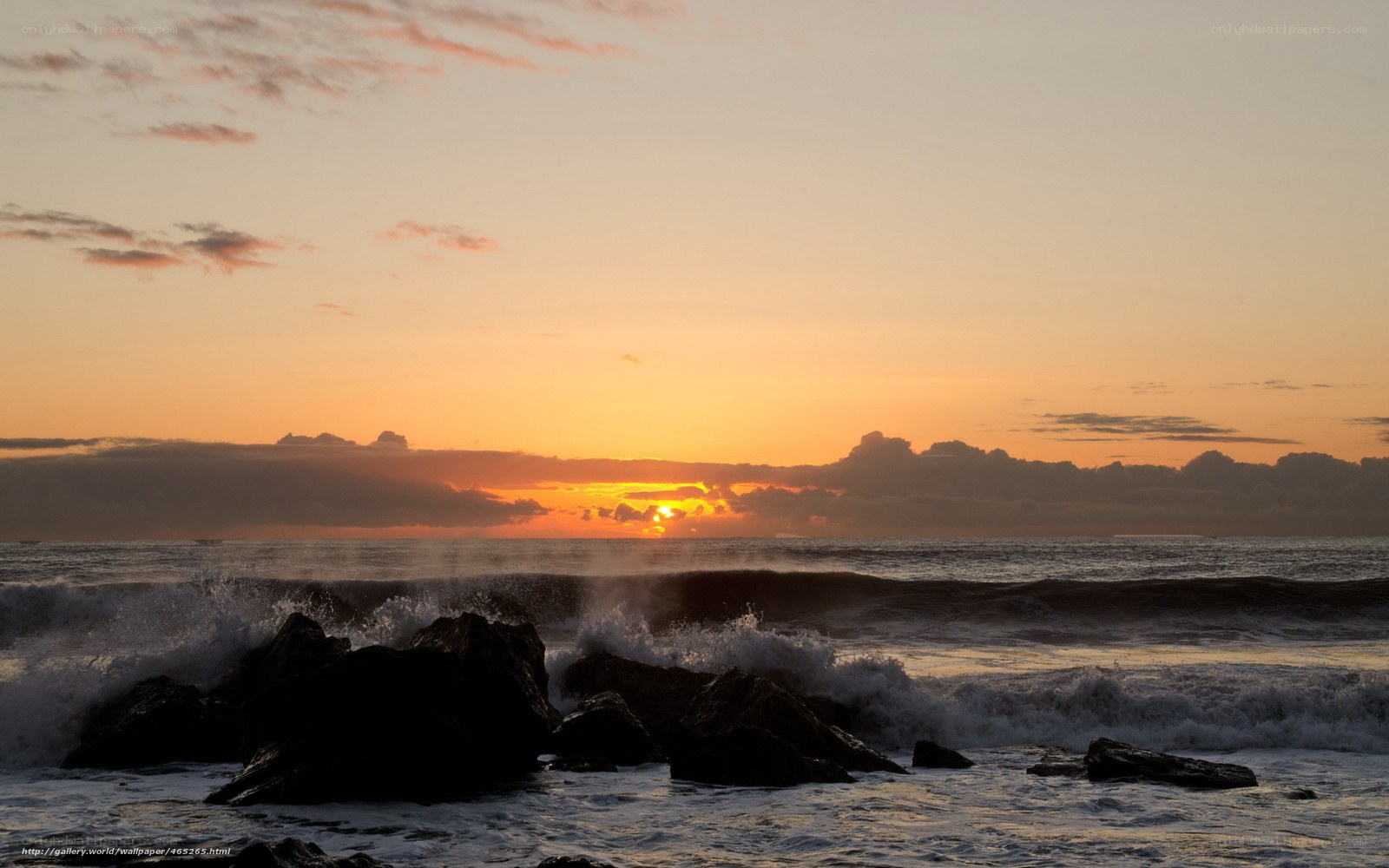 Sunset over rocky shore