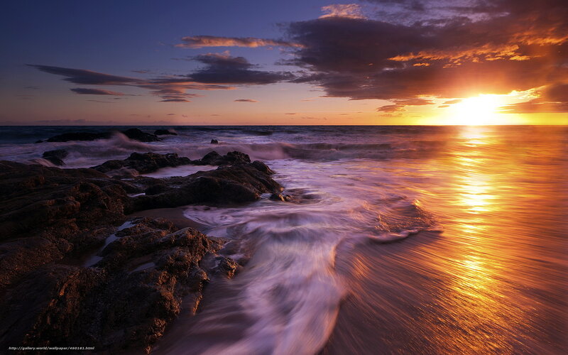 Sunset over rocky shore
