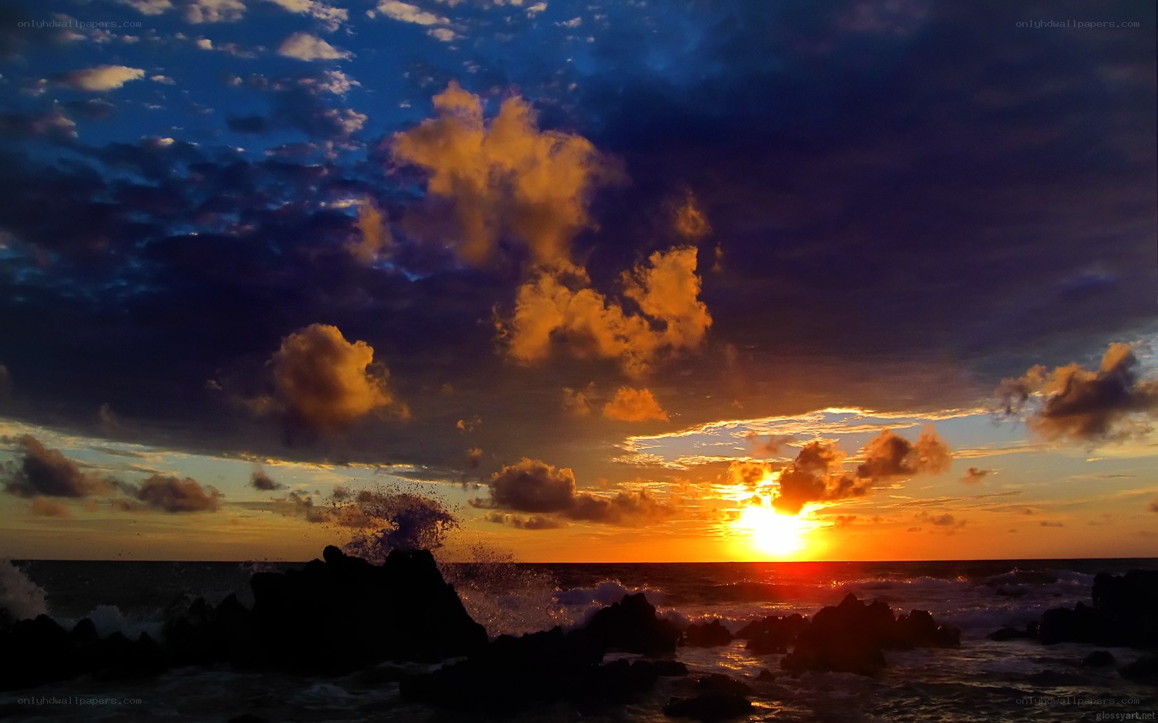 Sunset over rocky shore