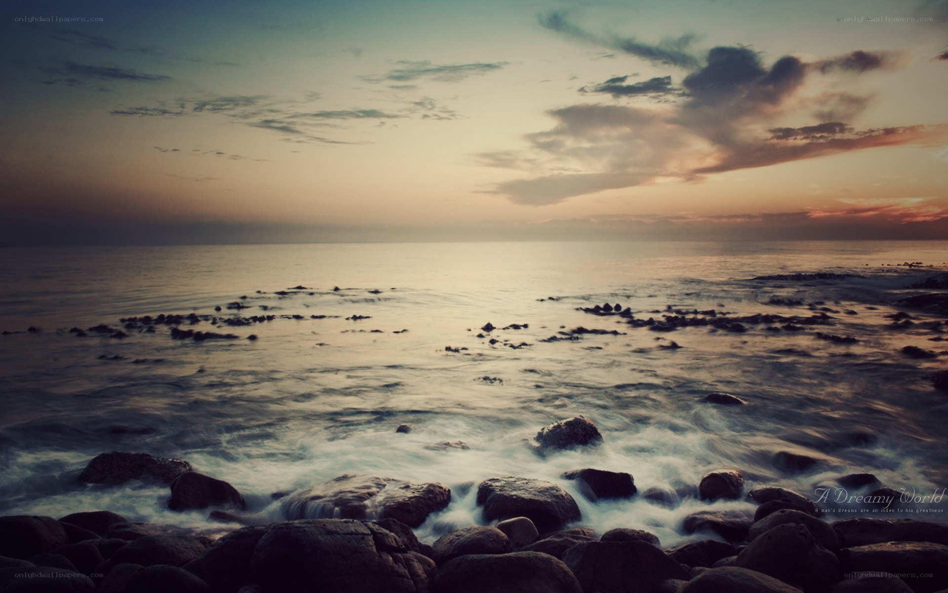 Sunset over rocky shore
