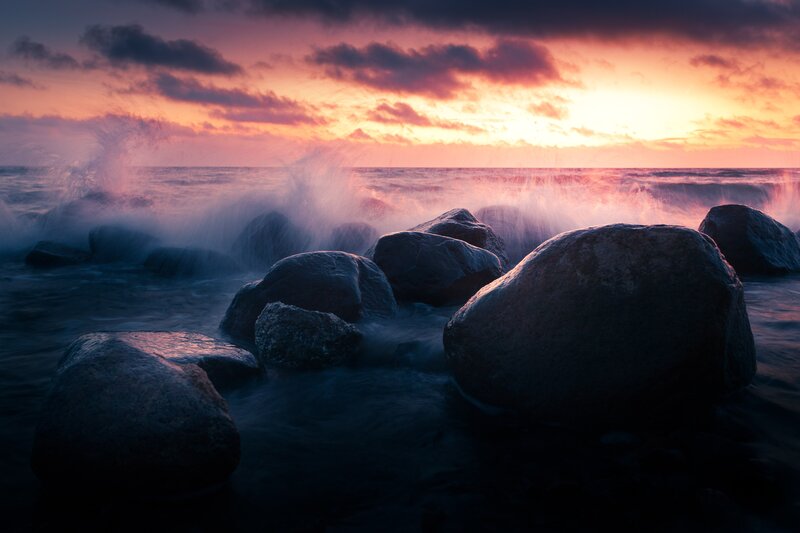 Sunset over rocky shore