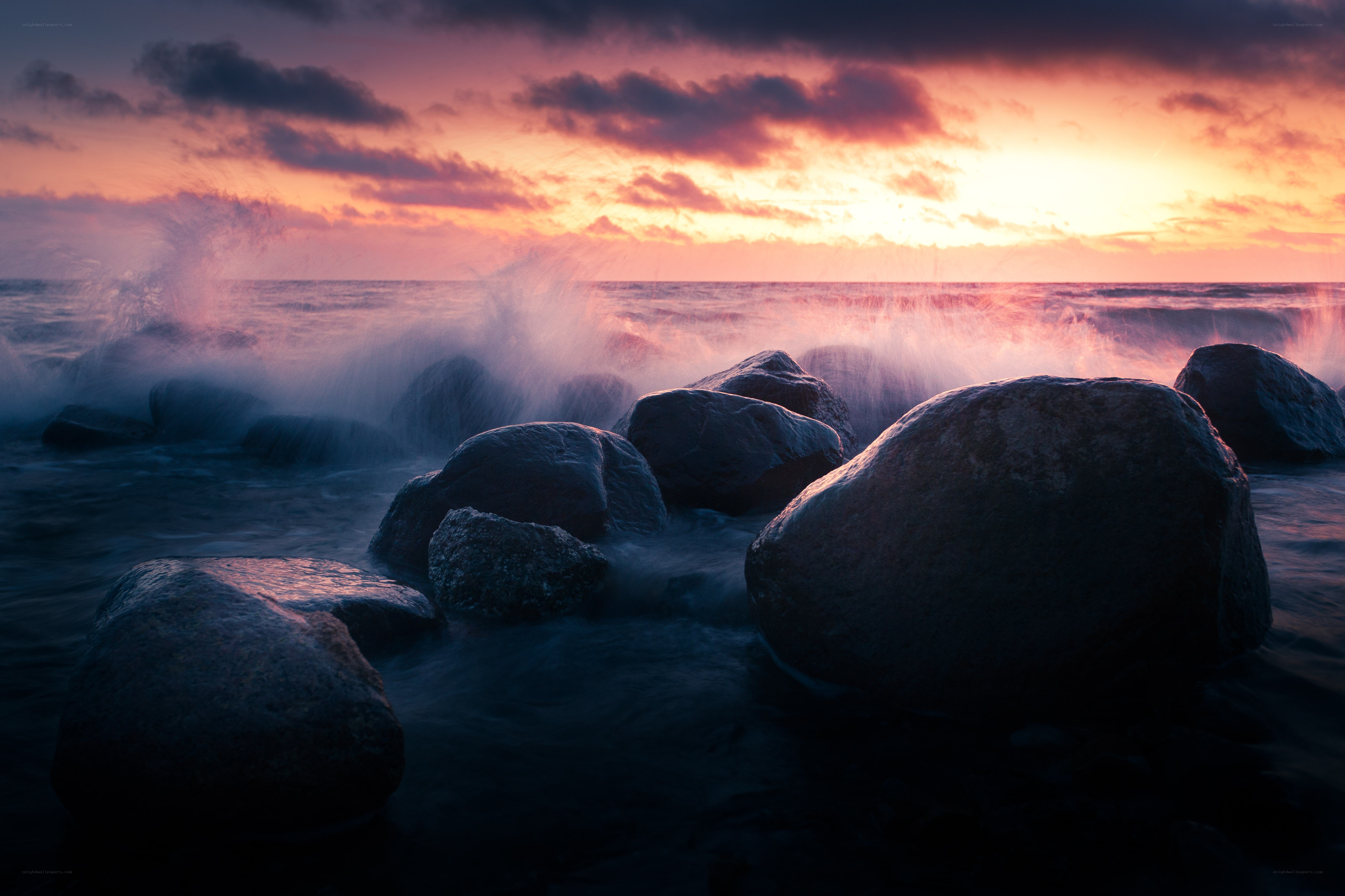 Sunset over rocky shore