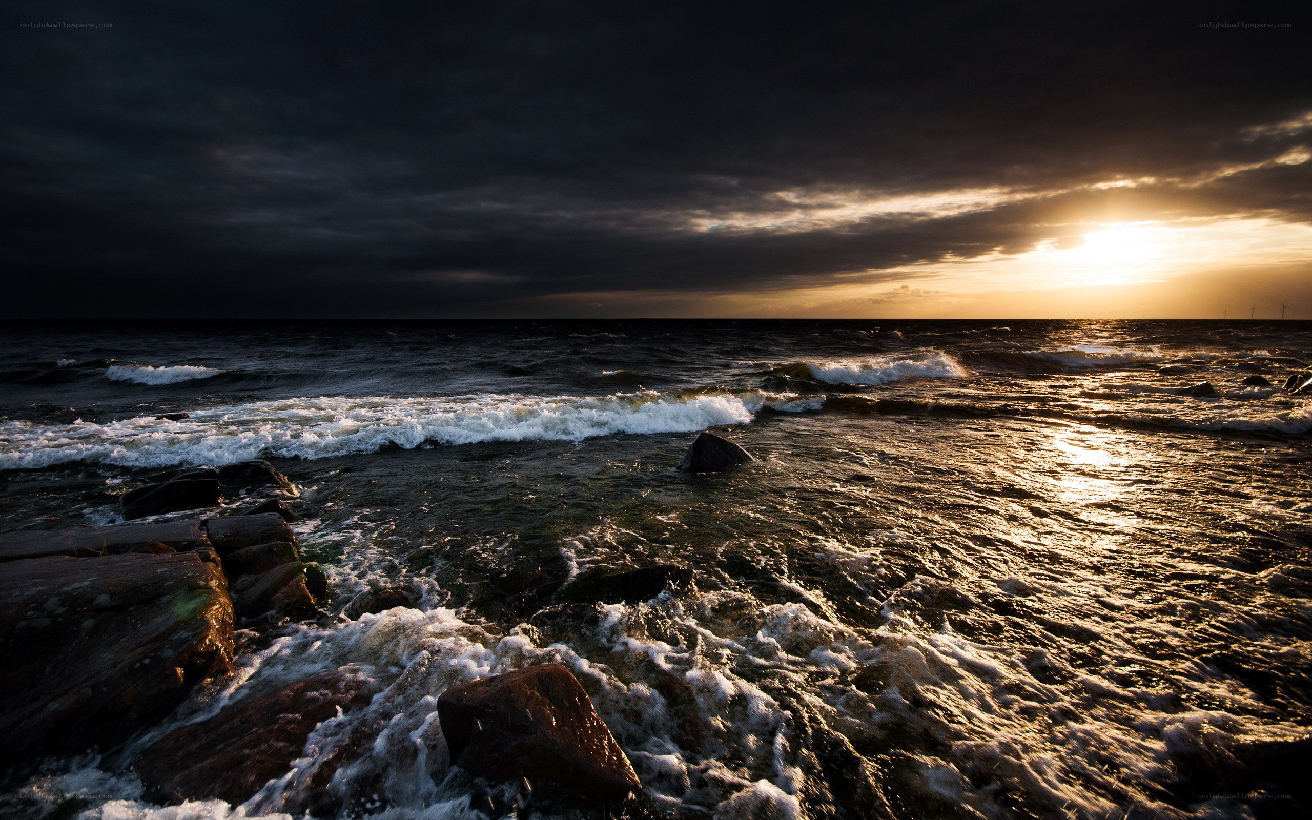 Sunset over rocky shore