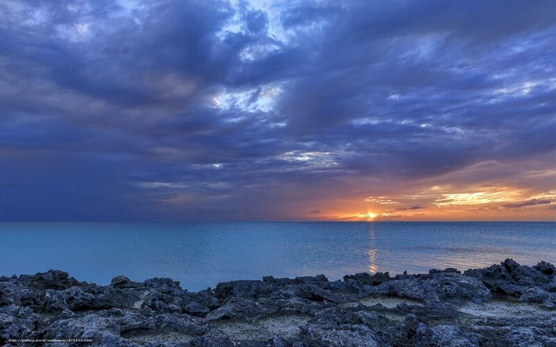 Sunset over Rocky Shore — Blue, Dramatic, Photograph, Ocean, Clouds, Sun