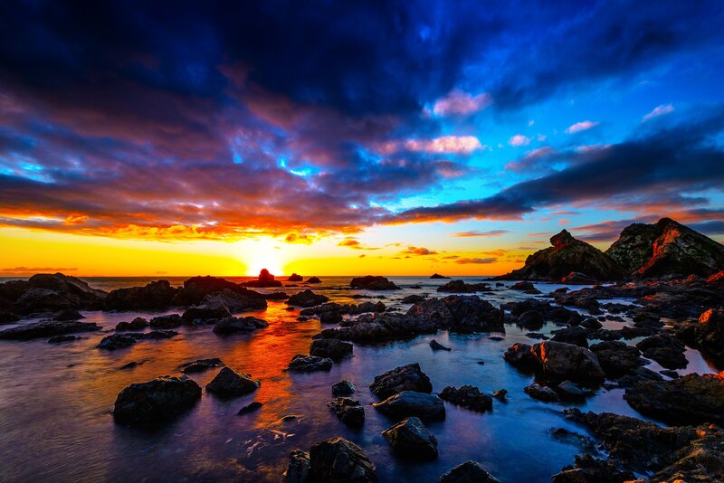 Sunset over Rocky Shore — Blue, Dramatic, Photograph, Rocks, Ocean, Sky