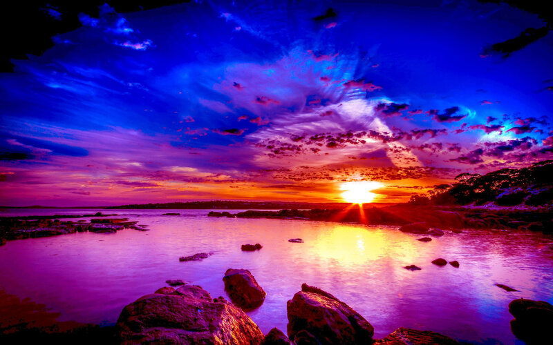 Sunset over Rocky Shore — Blue, Dramatic, Photograph, Sun, Clouds, Rocks, Water