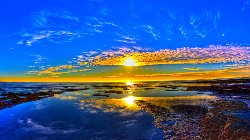 Sunset over Rocky Shore — Blue, Dramatic, Photograph, Sun, Clouds