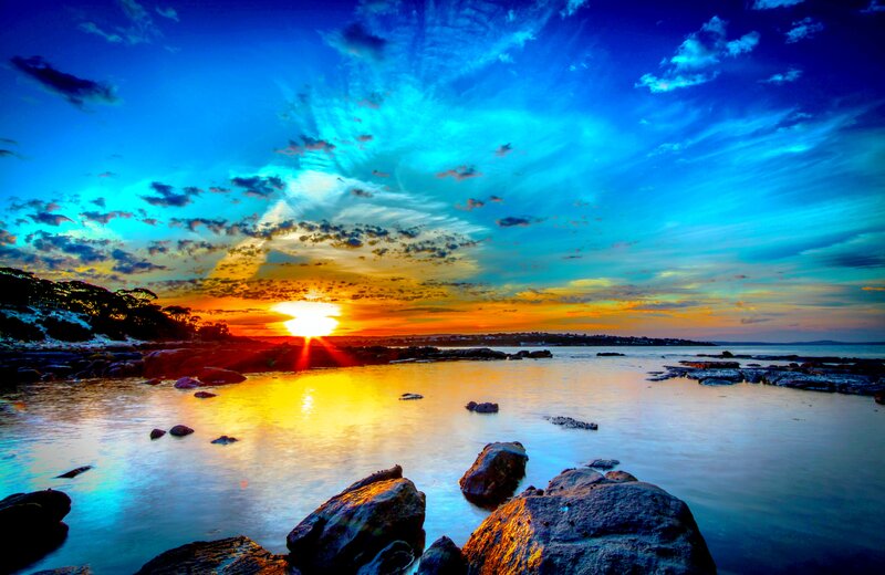 Sunset over Rocky Shore — Blue, Dramatic, Photograph, Sun, Rocks