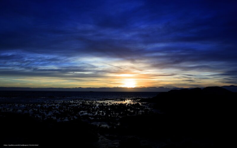 Sunset over Rocky Shore — Blue, Dramatic, Photograph, Sun