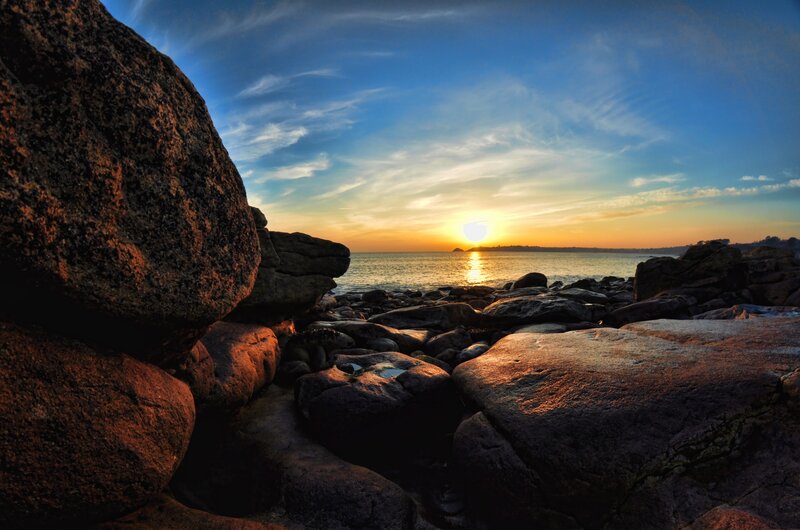Sunset over Rocky Shore — Blue, Serene, Photograph, Rocks