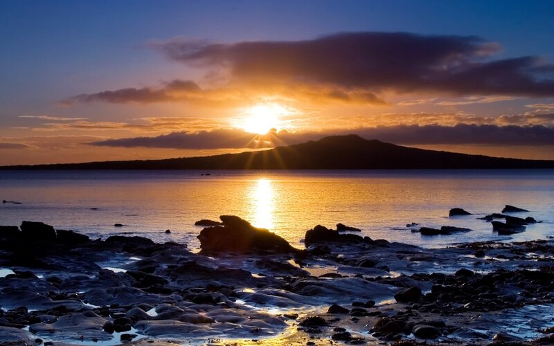 Sunset over Rocky Shore — Blue, Serene, Photograph