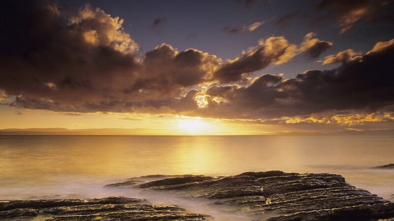 Sunset over Rocky Shore — Gold, Dramatic, Photograph, Clouds