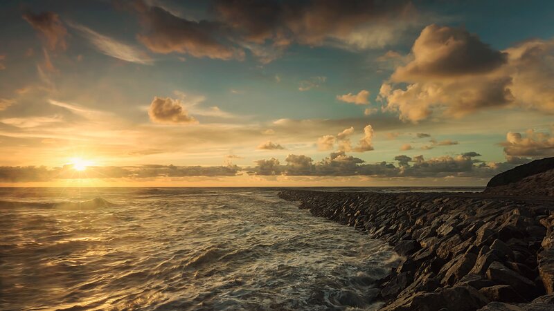 Sunset over Rocky Shore — Gold, Dramatic, Photograph